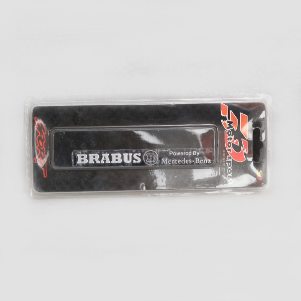 9613 IDV Шильдик аллюм. "BRABUS" 107*13 мм на чёрном фоне